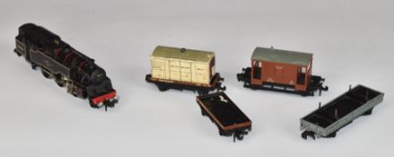 Five Hornby Dublo 00 gauge locomotives and rolling stock including BR 80033 tank locomotive.