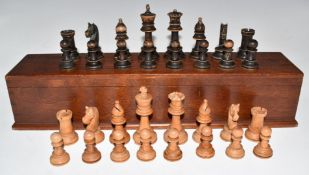 Staunton style turned boxwood chess set, height of king 8.2cm, in mahogany box.