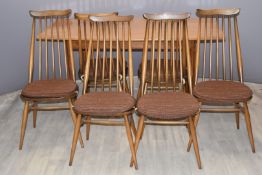 Ercol or similar dining table and six chairs, length 152 x width 88cm