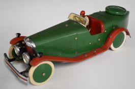 Meccano Constructor Car 2 with green body and hubs, red wheel arches, driver and key.