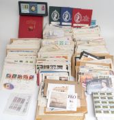 A large accumulation of GB and Jersey first day covers, stamps, booklets, a Strand album etc