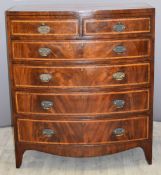 Georgian mahogany and satinwood crossbanded bow front chest of two over four drawers, W 105 x D 55 x
