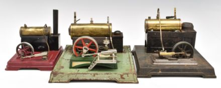 Three stationary live steam engines comprising a Fleischmann with oscillating cylinder and governor,