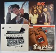Approximately 130 albums and twelve inch singles including AC/DC, Rush, Led Zeppelin, Black Sabbath,