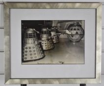 Photograph of Doctor Who filming, Daleks attacking a Mechanoid, with the crew beyond, 18 x 25cm
