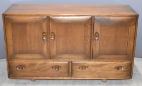Ercol retro/mid century modern light elm sideboard, fitted three cupboards and two drawers, W 130