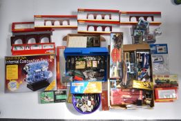A large collection of Hornby and similar 00 gauge model railway buildings, cars, parts and
