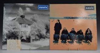 Oasis - 2 twelve inch singles comprising Live Forever (CRE 185T) and Roll With It (CRE 212T).