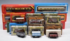 Thirty-two Hornby, Wrenn, Tri-ang, Mainline, Bachmann and Airfix 00 gauge model railway coaches