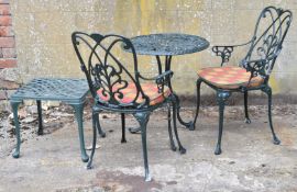 Metal garden table, two chairs and a side table