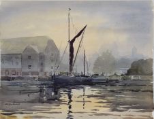 Keith Burtonshaw watercolour sailing boat with warehouse beyond, signed lower left, 38 x 49cm