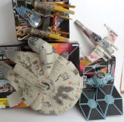 Four Star Wars vehicles comprising Kenner Electronic Millennium Falcon Ship and Tie Fighter, Tonka