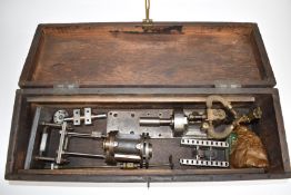 Live steam oscillating engine together with a part-built steam engine, H30cm, Meccano motor,