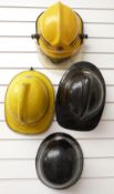 Four Gloucestershire Fire Service helmets comprising Calms & Brother Inc with visor, 1989 dated