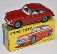 Corgi Toys diecast model MGB GT with red body and cream interior, 327, in original box.