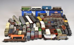 Eighty-two Hornby, Bachmann, Dapol and similar 00 gauge model railway wagons, vans and rolling