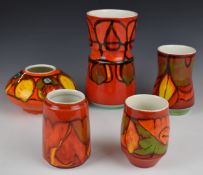 Five Poole Pottery Delphis vases and bowl, all with Poole backstamp, model numbers and painter's
