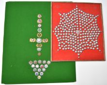 Two displays of Fire Service badges and buttons, one Gloucestershire, the other including CAA, North