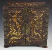 Japanese lacquer twin handled travelling collector's or jewellery cabinet with gilt decoration,