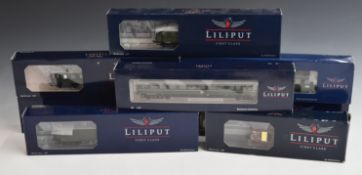 Eight Bachmann Liliput 00 gauge model railway coaches and wagons, some First Class, all in
