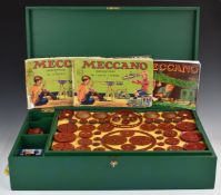 Meccano Outfit 10 with gold, blue and red parts including motors, digger bucket, tyres etc in