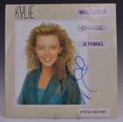 Kylie Minogue - Wouldn't Change A Thing (PWLT42). Appears EX. Signed on front cover