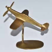 Brass trench art or similar model of a Spitfire on stand, wingspan 15.5cm