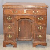 19thC walnut ladies desk fitted seven drawers, brushing slide and central cupboard, W87 x D52 x