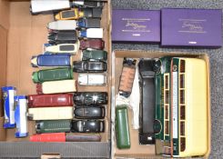 Thirty-four Corgi, Dinky, Solido and similar diecast model commercial vehicles including taxis,