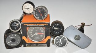 Classic and vintage car or motorcycle gauges, to include Smiths rev counter in original box,