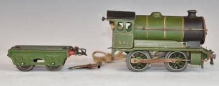 Hornby 0 gauge clockwork locomotive and tender 1842.