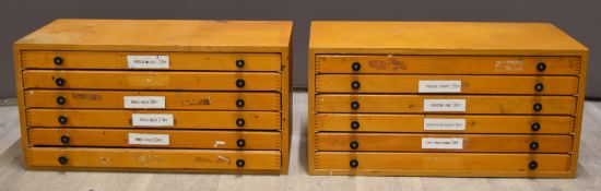 Two printer's cabinets, each with six drawers with divisions and printer's type. Would make useful