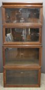 Globe Wernicke four tier oak bookcase, W86 x D46 x H194cm