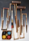Vintage croquet set comprising two 'Selected Hickory' shafted mallets, six Jaques cast iron hoops/