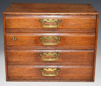 Oak collector's cabinet of four drawers, W39 x D26 x H31cm