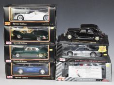 Seven Maisto 1:18 scale diecast model vehicles including Mercedes CLK-GTR Street Version, Porsche