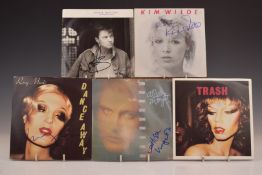 Approximately 30 singles including Paul Young, Joss Stone, Band Aid, Alison Moyet etc. All signed