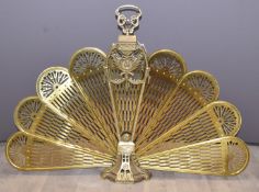 Brass expandable peacock fire guard, H68cm and an inlaid Edwardian mahogany fire screen