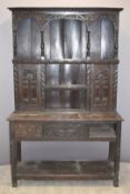 19thC oak dresser with carved decoration W 124 x D45 x H198cm