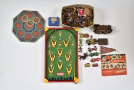 A collection of various toys and games including Floodlit Football bagatelle, quoits, 'Joey' The