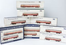 Eight Piko 00 gauge model railway coaches and coach sets BR195 and BR185, all in original boxes.