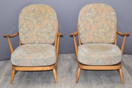 Two Ercol retro/mid century modern light elm stick back armchairs