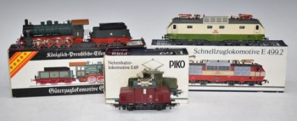 Three Piko 00 gauge model railway locomotives E69, E499.2 and one other, all in original boxes.