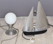 Art Deco chrome lamp formed as a sailing boat and a further lamp with stepped base, height of larger