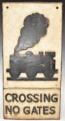 Cast iron 'crossing no gates' road sign, with steam locomotive above, 58 x 29cm