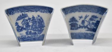 A pearlware asparagus server, printed in underglaze blue with a Chinese landscape, within a