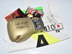 Frank Bruno signed boxing glove and signed photograph together with a 2002 Japanese Formula 1