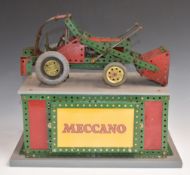 Meccano motorised shop display digger or low loader tractor, raised on illuminated base, 38 x 25.5 x