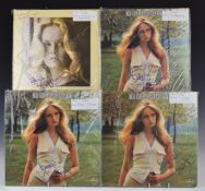 Forty-three albums and twelve inch singles, all signed on front covers by Lisa Stansfield, Twiggy,