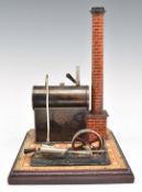 Bing c1900-1905 stationary live steam engine with oscillating cylinder, on wooden tiled effect base